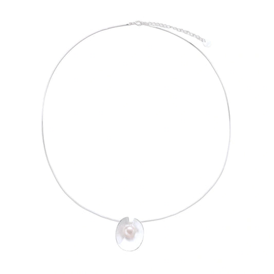 Sterling silver disc necklace with textured finish and centered freshwater pearl on delicate chain