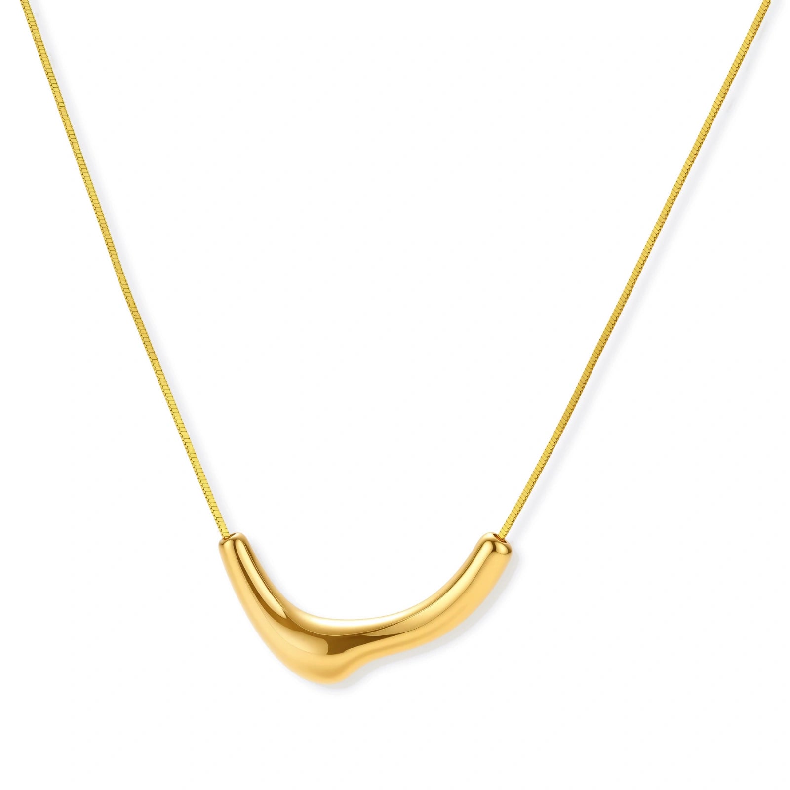 Minimalist gold-plated curved pendant necklace on delicate chain against cream background, showing adjustable length