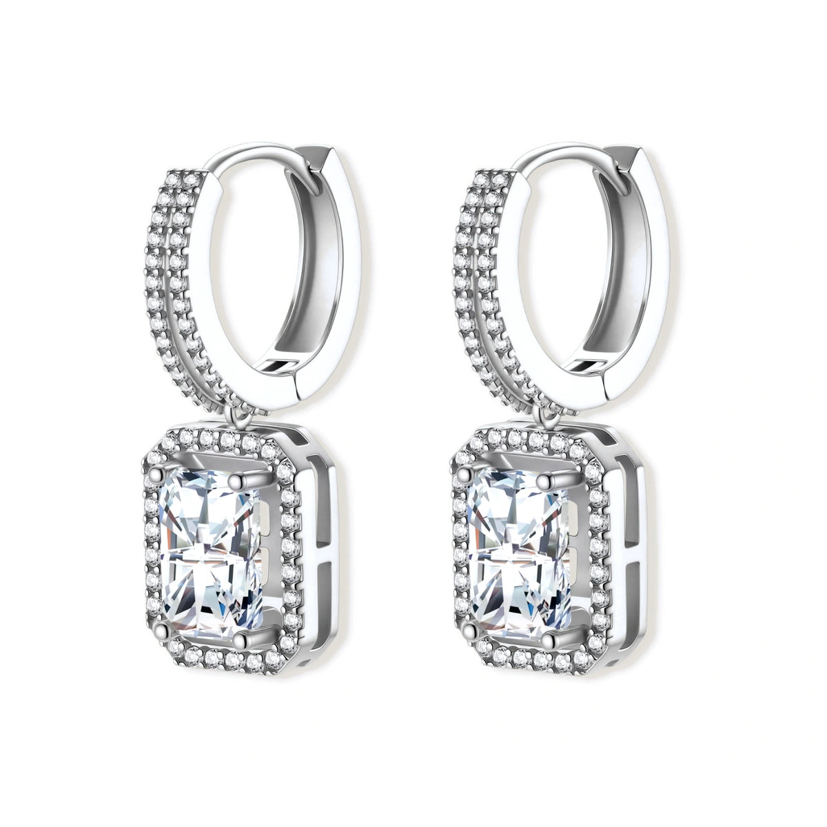Sterling silver huggie hoops with emerald-cut moissanite drops featuring pavé-set crystals on white background.