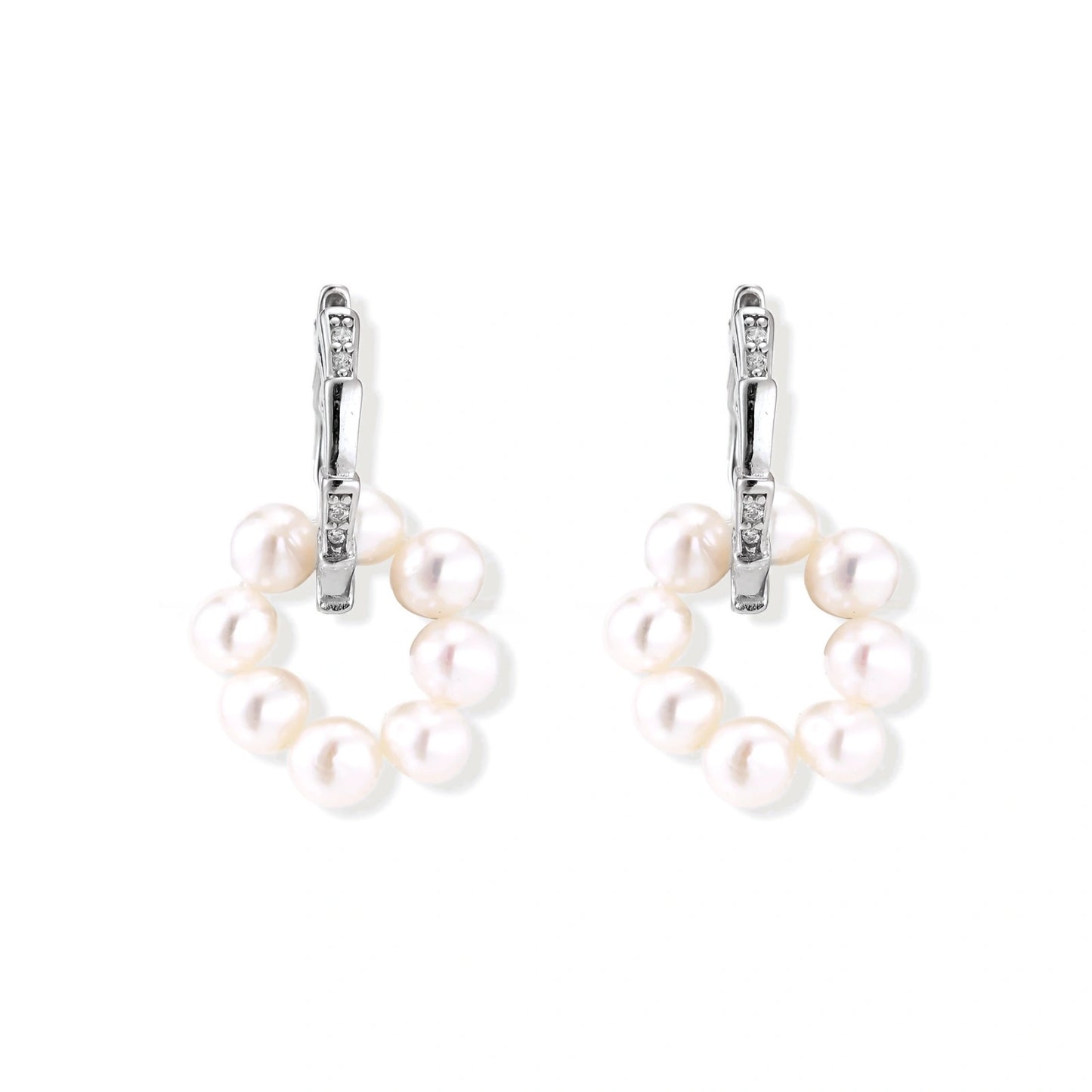 Rhodium-plated silver hoop earrings with freshwater pearls arranged in crescent formation and diamond accents