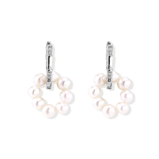 Rhodium-plated silver hoop earrings with freshwater pearls arranged in crescent formation and diamond accents