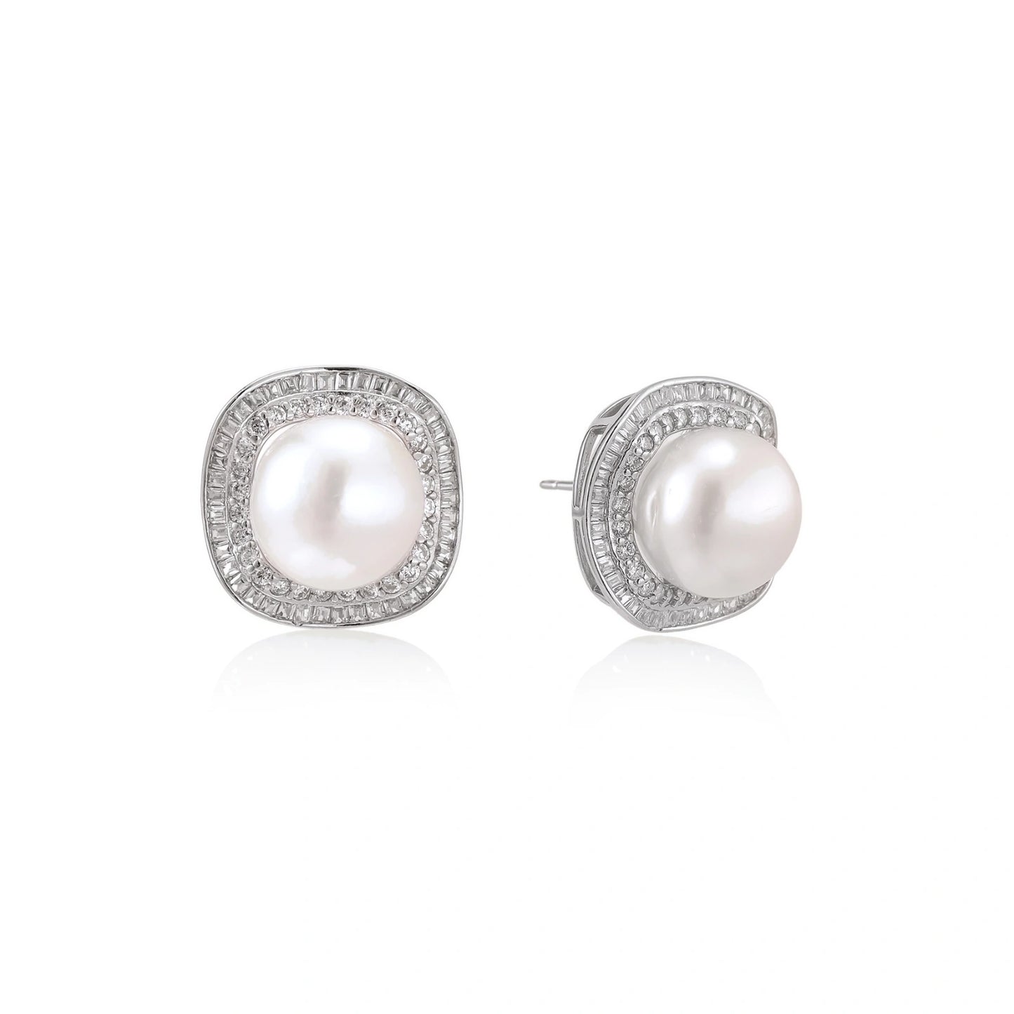Rhodium-plated sterling silver stud earrings with round freshwater pearls surrounded by geometric crystal halos on cream background.