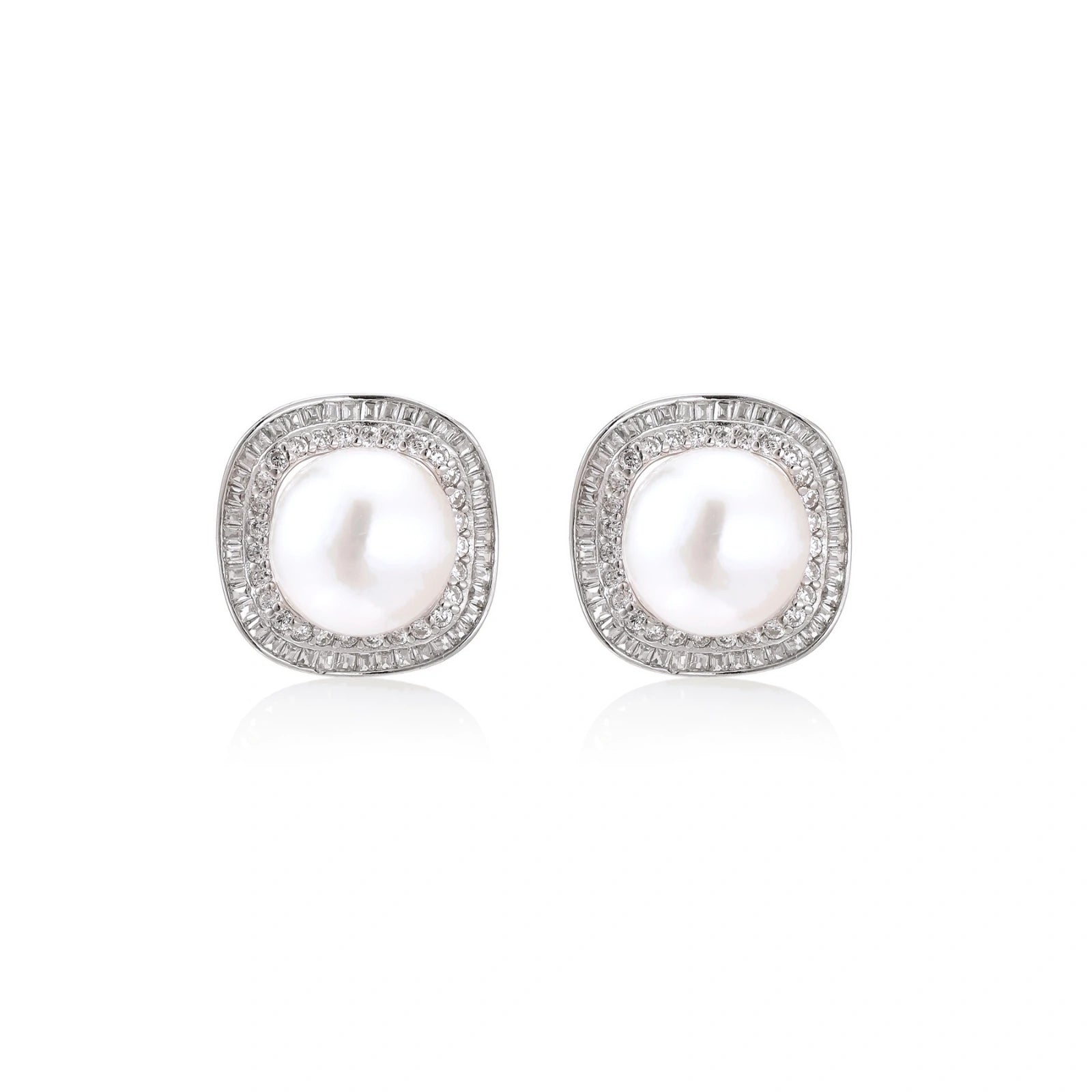 Rhodium-plated sterling silver stud earrings with round freshwater pearls surrounded by geometric crystal halos on cream background.