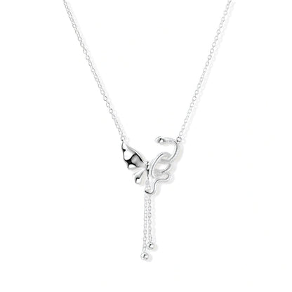 Sterling silver butterfly pendant with textured wing detail on adjustable Y-chain with ball drop ends