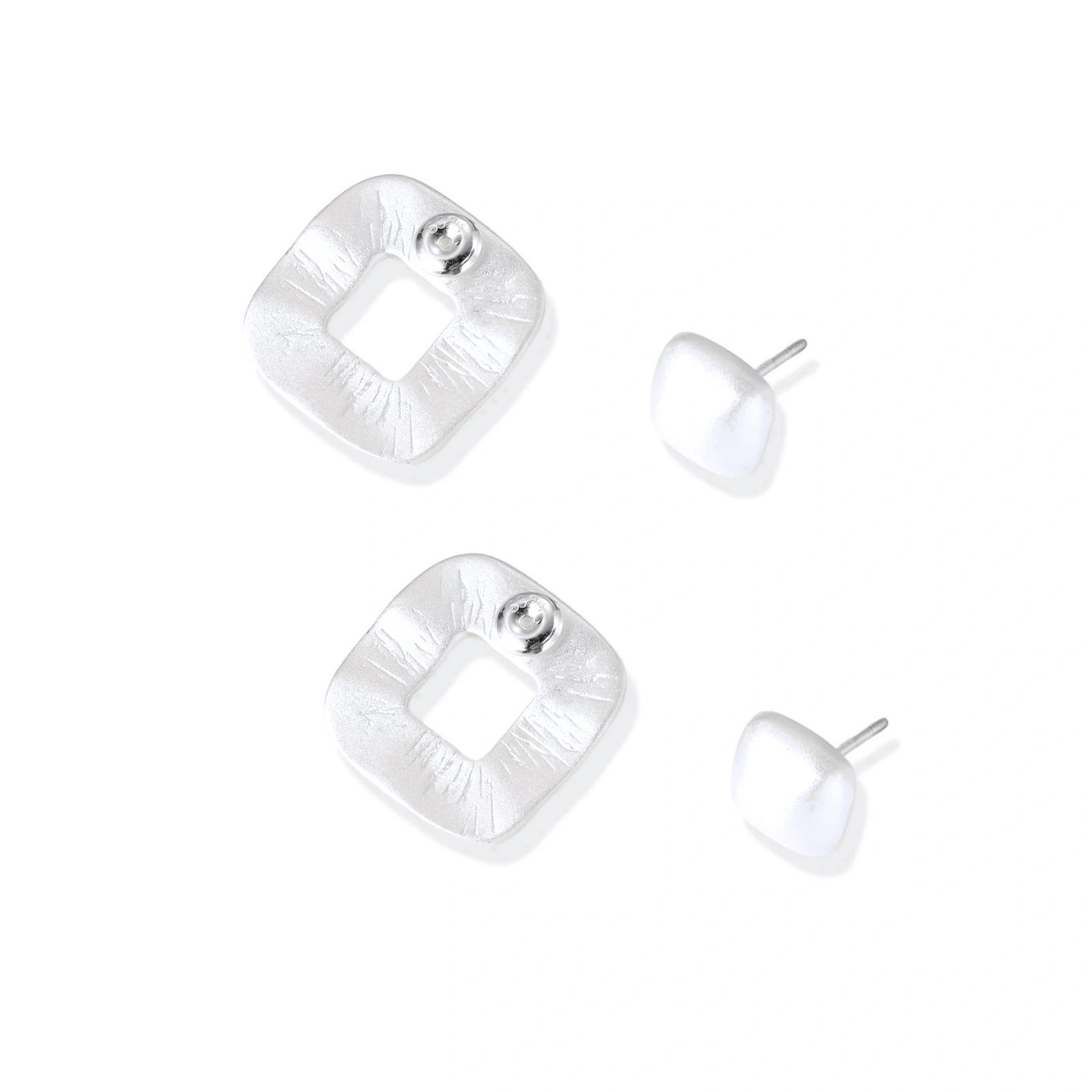 Pair of geometric sterling silver earrings with frosted square frames and glossy rounded studs on white background