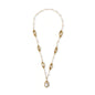 14K gold plated necklace with organic leaf motifs and freshwater pearls arranged in an elegant chain design on neutral background.